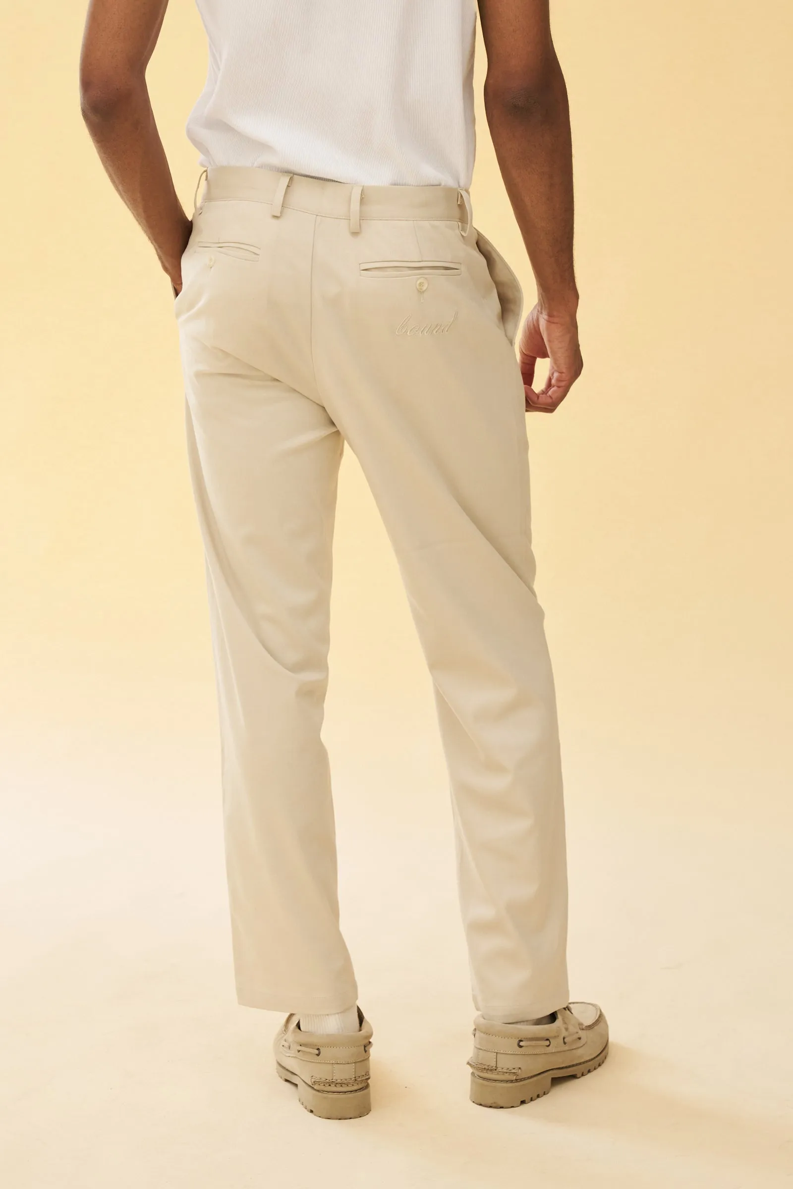 PLEATED SMART TROUSERS - CREAM
